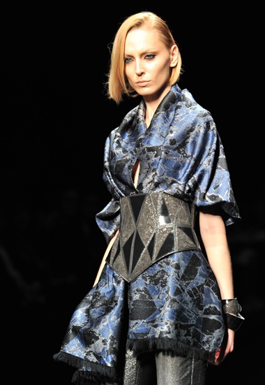 Tokyo, Tokyo, JAPAN: A model displays a creation of Atsushi Nakashima during his 2012/2013 autumn and winter collection in Tokyo on March 19, 2012. The Tokyo fashion Week runs from 18 to 24 March. AFP PHOTO/Yoshikazu Tsuno