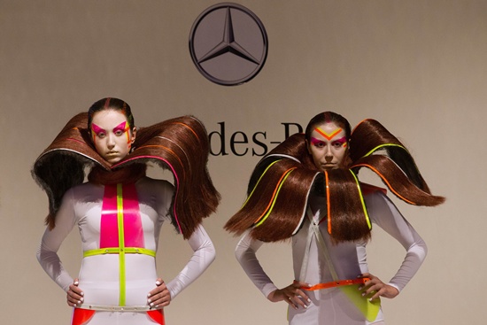 Kuala Lumpur, MALAYSIA: Models present creations by Malaysian designer Winnie Loo during the Mercedes-Benz Stylo Fashion Grand Prix in downtown Kuala Lumpur on March 20, 2012. 