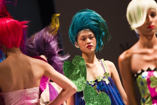 Kuala Lumpur, MALAYSIA: Models present creations by Malaysian designer Lois Lee on March 20, 2012 during the Mercedes-Benz Stylo Fashion Grand Prix in downtown Kuala Lumpur. AFP PHOTO/Mohd Rasfan