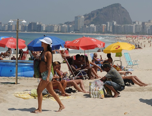 Rio de Janeiro, Rio de Janeiro, BRAZIL: View of Copacabana beach in Rio de Janeiro on September 19, 2012 in Brazil. Copacabana beach was included on a US website Huffington Post as one of the most dangerous beaches in the world, due to high level of crimes. AFP PHOTO/Antonio Scorza
