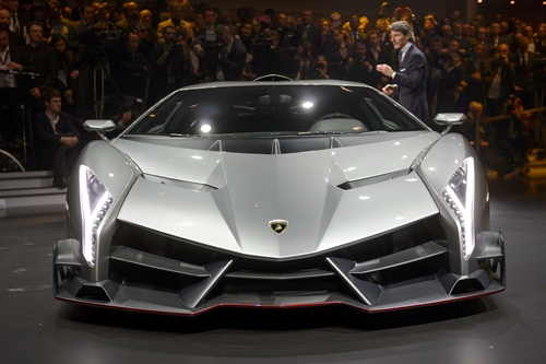 Geneva, Geneve, SWITZERLAND: The new Lamborghini Veneno is introcuded by CEO and Chairman Stephan Winkelmann during a preview of Volkswagen Group (VW) on March 4, 2013 ahead of the Geneva Car Show in Geneva. AFP PHOTO/Fabrice Coffrini