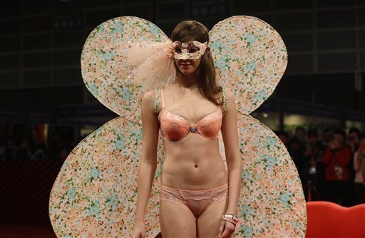 A model presents lingerie of the Fall/Winter collection by Hong Kong fashion brand Sky-High Underwear during the Fashion Week Expo in Hong Kong Tuesday, Jan. 14, 2014. The exhibition invited nearly 1,850 exhibitors from 29 countries and regions. (AP Photo/Kin Cheung) (AP Photo/Kin Cheung)