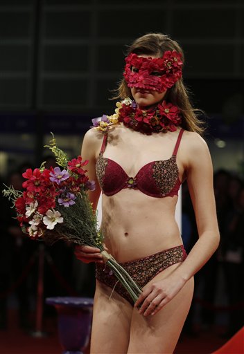 A model presents lingerie of the Fall/Winter collection by Hong Kong fashion brand Sky-High Underwear during the Fashion Week Expo in Hong Kong Tuesday Jan. 14, 2014. The exhibition invited nearly 1,850 exhibitors from 29 countries and regions. (AP Photo/Kin Cheung) (AP Photo/Kin Cheung)