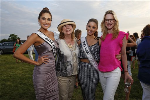 IMAGE DISTRIBUTED FOR JAMES BEARD FOUNDATION - From left, Miss Universe Gabriela Isler, President of the James Beard Foundation Susan Ungaro, Miss USA Nia Sanchez, and actress Stephanie March seen at the James Beard Foundations Chefs & Champagne event at the Wolffer Estate, on Saturday, July 26, 2014 in Sagaponack, N.Y. (Photo by Mark VonHolden/Invision for James Beard Foundation/AP Images)