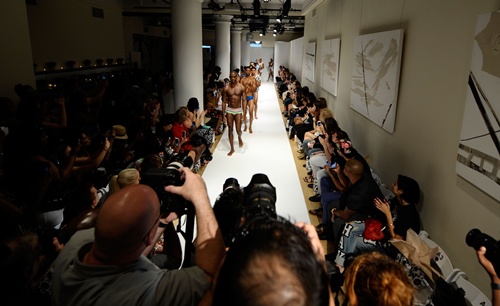 New York, New York, UNITED STATES: Models walk the runway at the Swimwear Collective during Mercedes-Benz Fashion Week Spring 2015 at Helen Mills Event Space on September 5, 2014 in New York City. Ilya S. Savenok/Getty Images/AFP