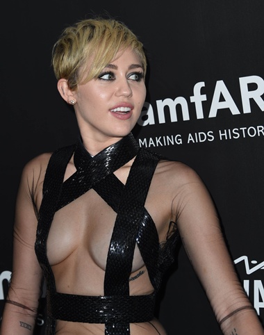 Hollywood, California, UNITED STATES: Miley Cyrus attends amfAR’s fifth annual Inspiration Gala in Los Angeles, October 29, 2014 at Milk Studios in Hollywood, California. AFP PHOTO/Robyn Beck