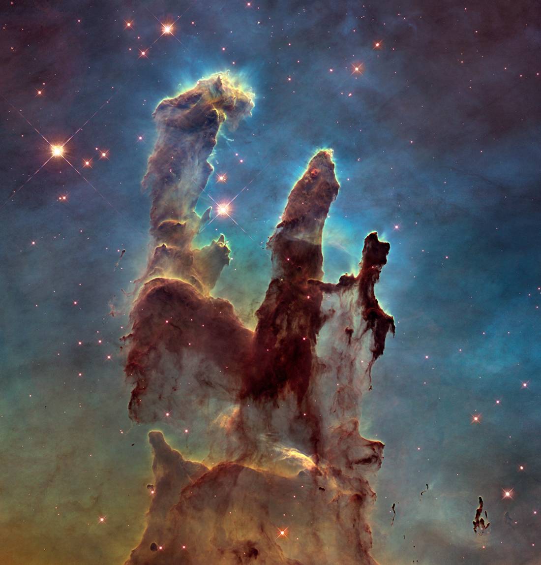 เนบิวลาอินทรีหรือเสาหลักแห่งการสร้างที่บันทึกขึ้นใหม่จากกล้องฮับเบิล (AFP PHOTO / NASA, ESA/Hubble and the Hubble Heritage Team) 