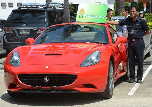 Ferrari, Maserati, Lamborghini, Bugatti. The prestigious names embody performance and luxury across the automotive world. -- Photo: AFP