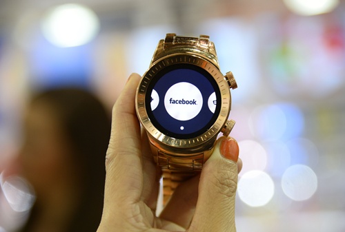 Las Vegas, Nevada, UNITED STATES: A Burg smartwatch is seen at the Consumer Electronics Show in Las Vegas Nevada January 7, 2015. The 3G touchscreen Burg smart watch combines fashion with functionality, allowing users to make and receive calls without being linked to a smart phone, and features a built-in SIM-card slot, video camera, micro SD card slot, Bluetooth and GPS. AFP PHOTO/ROBYN BECK