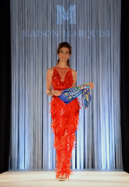 Budapest, HUNGARY: A model presents a creation by Hungarian designer Bori Toth of the Maison Marquise studio by on the catwalk of Hotel Boscolo in Budapest on May 7, 2015 during the Budapest Fashin Nights. AFP PHOTO/Attilia Kisbenedek