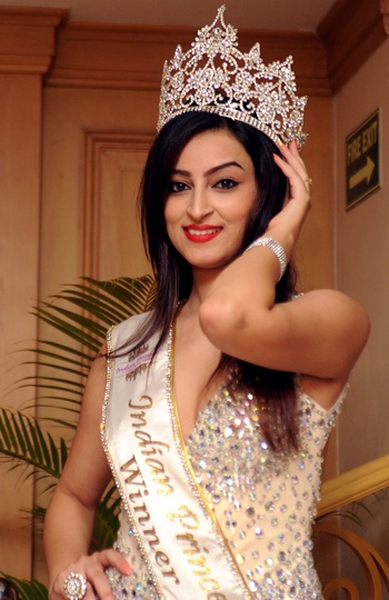 MUMBAI, INDIA: Indian Princess 2014 winner Chandani Sharma poses for a photograph during a promotional event for the forthcoming Indian Princess and Indian Princess International 2015 finale in Mumbai on late May 14, 2015. AFP PHOTO/STR