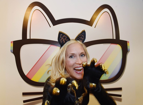 Los Angeles, California, UNITED STATES: Cat Lover Amy Raasch known for her Kitty Decides performances, poses for photos at the inaugural CatConLa event in Los Angeles, California on June 7, 2015. AFP PHOTO/Mark Ralston