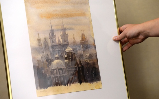 Nuremberg, Bavaria, GERMANY: (FILES) The picture Prague in the Fog, a watercolor signed A Hitler is displayed on June 11, 2015 in the Weidler auction house in Nuremberg, southern Germany. AFP PHOTO/Christof Stache