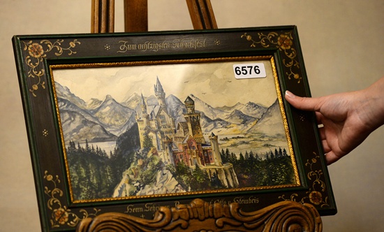 Nuremberg, Bavaria, GERMANY: (FILES) A painting of Neuschwanstein Castle, a watercolor signed A Hitler, is displayed on June 11, 2015 in the Weidler auction house in Nuremberg, southern Germany. AFP PHOTO/Christof Stache