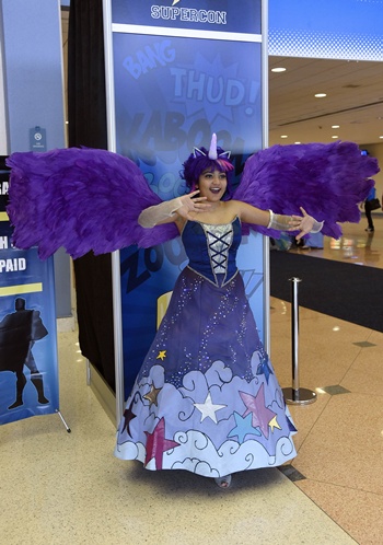 Miami, Florida, UNITED STATES: A fan poses for a photo during Florida SuperCon on June 25, 2015, at the Miami Beach Convention Center in Miami, Florida. AFP PHOTO/Rhona Wise