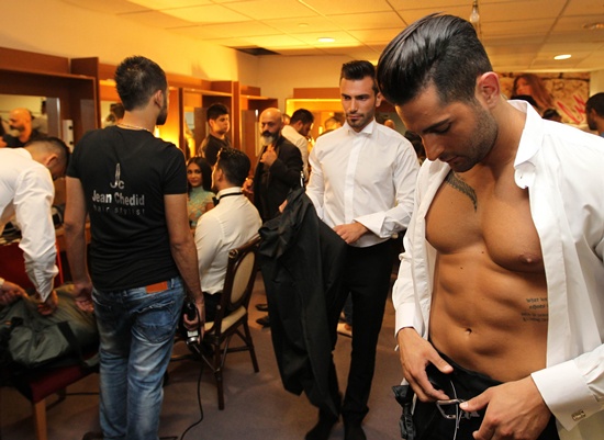 Jounieh, LEBANON: Lebanese men prepare to compete for Mr. Lebanon title during the beauty contest at Casino du Liban in Jounieh, north of the capital Beirut, on September 4, 2015. AFP PHOTO/Anwar Amro