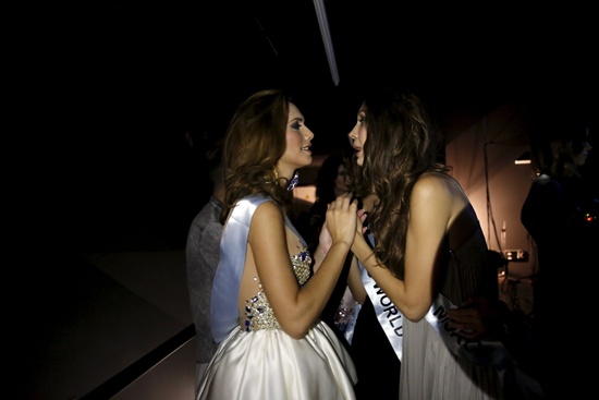 Angela Ponce, 24, (L) gets comforted by another contestant after both were eliminated in the Miss World Spain pageant in Estepona, southern Spain, October 25, 2015. Ponce, the first openly transsexual woman to compete to represent Spain at the Miss World pageant, was eliminated in the first knockout round. But Ponce already feels like a winner, she said, because her participation has brought visibility for the transgender community. We need to educate society for diversity, Ponce said. Picture taken October 25, 2015. REUTERS/Susana Vera
