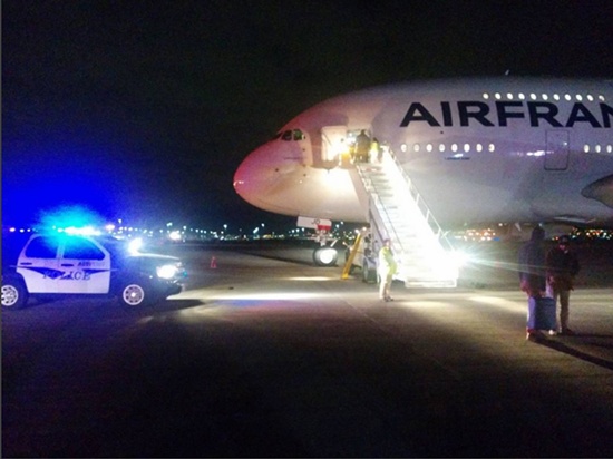 Salt Lake City, Utah, UNITED STATES: Air France flight 65 out of Los Angeles bound for Paris stands on the tarmac in Salt Lake City where it was diverted late November 17, 2015 due to security threats. Two Air France flights bound for Paris from the United States were diverted late November 17, 2015 due to security threats, media reports said, on the heels of deadly terror strikes in Paris. CNN reported that one jet was diverted to Salt Lake City, Utah, after taking off from Los Angeles, while the second left Washington and was diverted to Halifax, Canada. AFP PHOTO/Courtesy of @ara.adjamian on Instagram 