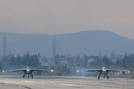 Latakia, SYRIA: (FILES) A file picture taken on December 16, 2015 shows two Russian Sukhoi Su-24 bombers at the Russian Hmeimim military base in Latakia province, in the northwest of Syria. A decades-long backer of the Syrian regime, Moscow dramatically raised the stakes this year by deploying its air force to bomb rebels fighting the army of Syrian President Bashar al-Assad. AFP PHOTO/Paul Gypteau