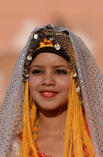 Kelaat Mgouna, Morocco: A Berber Moroccan woman, wearing traditional outfits, parades during the Miss Rose beauty contest as part of the yearly Rose Festival on May 13, 2016 in the town of Kelaat Mgouna, at the foot of the High Atlas Mountains in Morocco. AFP/Fadel Senna