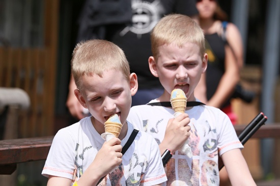 Zvole, Czech Republic: 8 years old twins Simon and Matous eat an ice during a meeting of twins and multiples in Zvole, Czech Republic, south Moravia, on May 29, 2016. AFP/Radek Mica