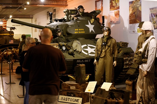 Catz, Manche, France: This picture taken on September 12, 2016 in Catz, northwestern France shows a WWII Cadillac M24 Chaffee light tank at the Normandy Tank Museum. The Normandy Tank Museums closure puts WWII items for sale, including tanks and other WWII items, in an auction to be held on September 18. AFP/Charly Triballeau