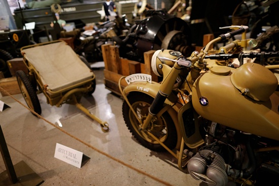 Catz, Manche, France: This picture taken on September 12, 2016 in Catz, northwestern France shows a BMW military motorbike from WWII at the Normandy Tank Museum. The Normandy Tank Museums closure puts WWII items for sale, including tanks and other WWII items, in an auction to be held on September 18. AFP/Charly Triballeau