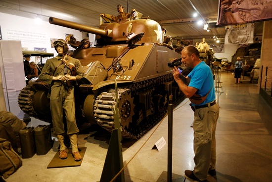 Catz, Manche, France: This picture taken on September 12, 2016 in Catz, northwestern France shows a WWII 1944 Chrysler M4A4 Sherman tank at the Normandy Tank Museum. The Normandy Tank Museums closure puts WWII items for sale, including tanks and other WWII items, in an auction to be held on September 18. AFP/Charly Triballeau