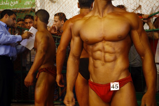 Gaza City, Palestinian Territories: Palestinian participants prepare for a bodybuilding competition in Gaza city on October 28, 2016. AFP/Mohammed Abed