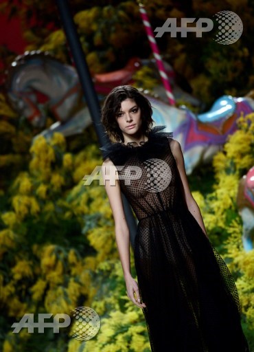 A model presents a creation by Jorge Vazquez on February 20, 2017, during the womens Fall/Winter 2017/2018 collection fashion show during the Mercedes-Benz Madrid Fashion Week in Madrid. Pierre-Philippe Marcou/AFP