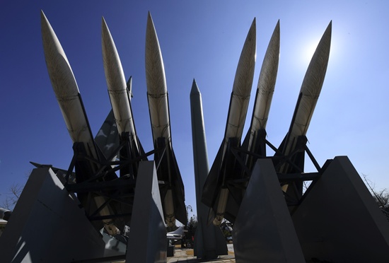 Seoul: Replicas of a North Korean Scud-B missile (C) and South Korean Hawk surface-to-air missiles are displayed at the Korean War Memorial in Seoul on March 6, 2017. AFP/Jung Yeon-Je