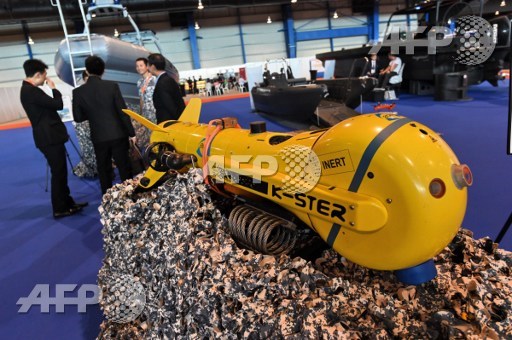 A display of the K-STER vehicle, an expandable Mine Disposal System (EMDS) remotely controlled from the Mine Countermeasure Vessel (MCMV) by fibre optic cable, at the 11th International Maritime Defence Exhibition and Conference (IMDEX) Asia in Singapore on May 16, 2017. ROSLAN RAHMAN / AFP