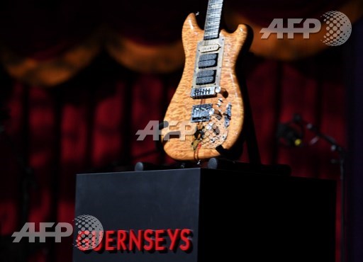  Jerry Garcias guitar is auctioned on May 31, 2017 in Brooklyn, New York. A guitar of Grateful Dead legend Jerry Garcia raised more than $3 million at an auction to support a leading civil rights group. Angela Weiss/AFP