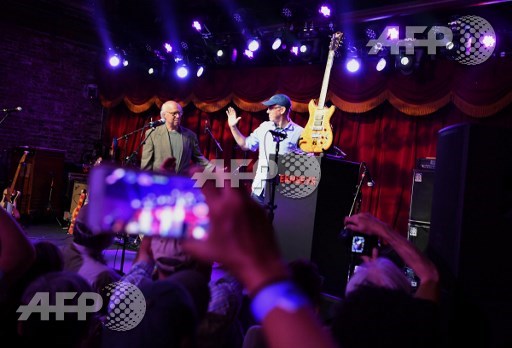 Brian Halligan, CEO of the marketing group HubSpot, wins Jerry Garcias guitar in an auction on May 31, 2017 in Brooklyn, New York. Angela Weiss/AFP