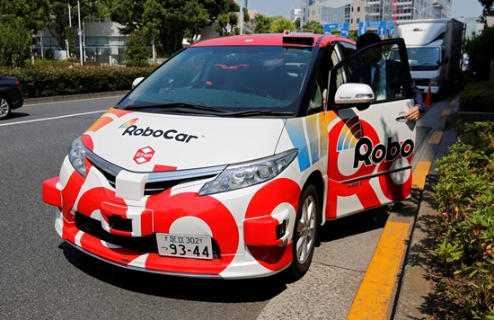 ZMP Incs RoboCar MiniVan, a self-driving Toyota Estima Hybrid car, is seen after a joint news conference between ZMP and Hinomaru Kotsu Co in Tokyo, Japan June 15, 2017. REUTERS/Toru Hanai