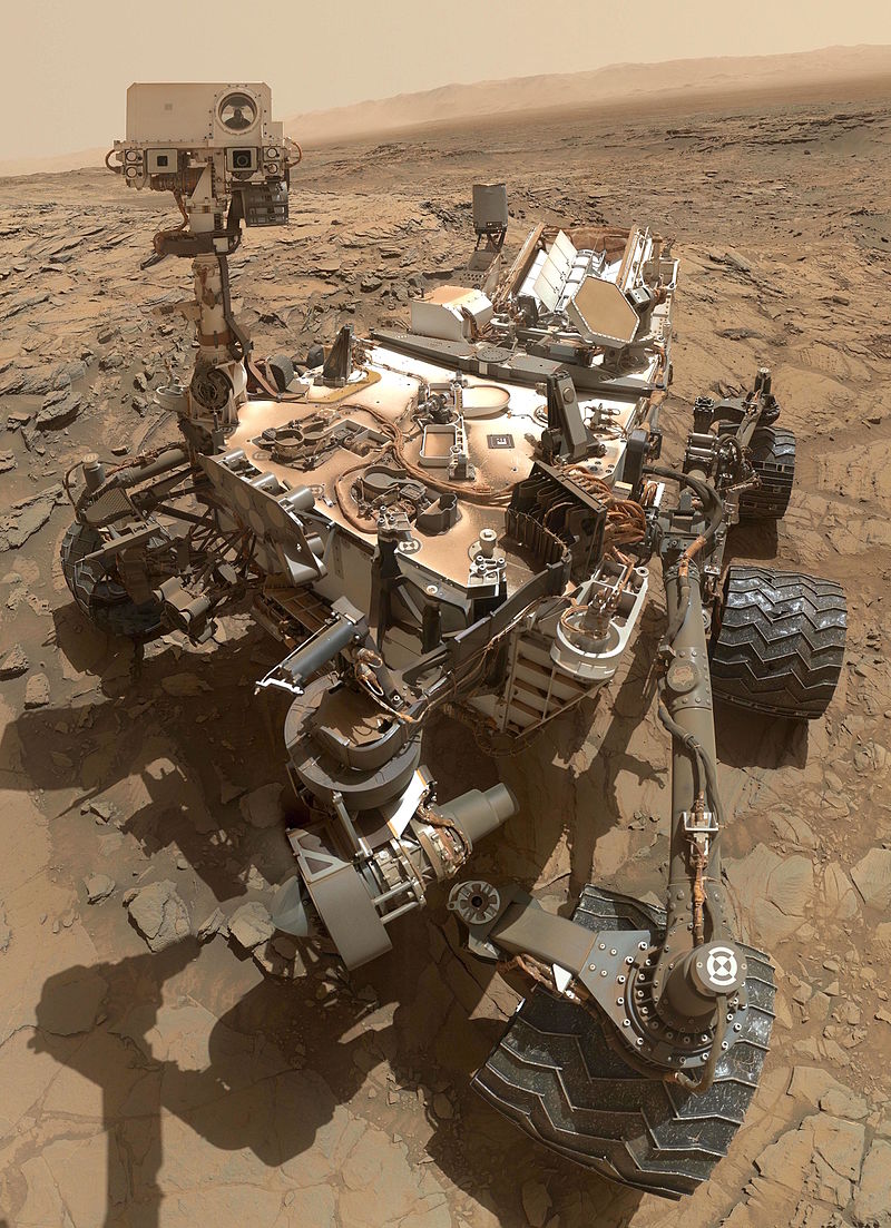 ยาน Curiosity  ขณะขุดเจาะสำรวจดาวอังคาร 