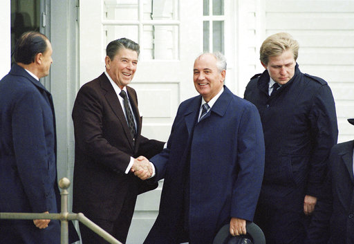 FILE - In this Oct. 11, 1986 file photo, President Ronald Reagan shakes hands with Soviet Leader Mikhail Gorbachev in Reykjavik, Iceland. When U.S. and Russian presidents meet, the rest of the world stops to watch. For decades, summits between leaders of the world powers have been heavily anticipated affairs in which every word, handshake and facial expression is scrutinized. (AP Photo/Ron Edmonds, File)
