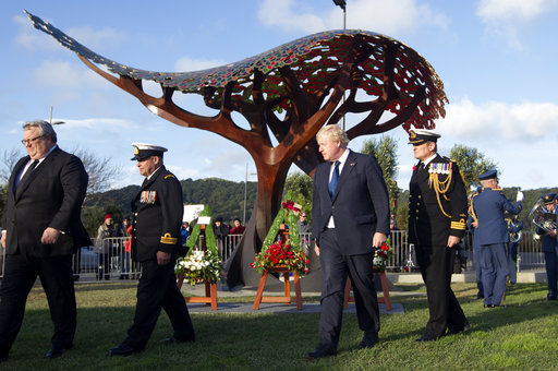 British Foreign Secretary Boris Johnson, center, walks during the service at Pukeahu National War Memorial Park in Wellington, New Zealand, Monday, July 24, 2017. Johnson is visiting the South Pacific nation for two days as Britain looks to strengthen its ties with its former colony amid a broader reshaping of Britains global relationships as it prepares to leave the European Union.(Mark Mitchell/New Zealand herald via AP)