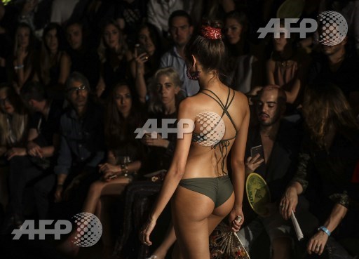 A model presents a creation by Colombian brand Agua Bendita at Colombiamoda during Colombias Fashion Week in Medellin, Antioquia department, on July 26, 2017. Joaquin Sarmiento/AFP