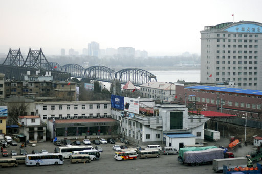 FILE - In this March 17, 2016, file photo, loaded trucks and vehicles wait in line at the border checkpoint before crossing the Friendship Bridge linking China and North Korea across the Yalu River, as seen from Dandong in northeastern Chinas Liaoning Province. China has long been the North’s main trading partner and diplomatic protector. But Kim Jong Un’s nuclear and missile tests have alienated Chinese leaders, who supported last month’s U.N. sanctions that slash North Korean revenue by banning sales of coal and iron ore. Beijing tried to head off the latest nuclear test, conducted Sunday, Sept. 3, 2017, by warning Pyongyang that such an event would lead to even more painful penalties. (Chinatopix via AP, File)