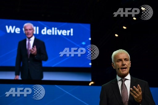 CEO of German carmaker Volkswagen (VW) Matthias Mueller delivers his speech during a Volkswagen preview night for the media on the eve of the opening of the Internationale Automobil Ausstellung (IAA) motor show in Frankfurt am Main, western Germany, on September 11, 2017. According to organisers, around 1,000 exhibitors from 39 countries will showcase their products and services. This years fair running from September 14 to 24, 2017 will focus on digitization, urban mobility and electric mobility. Tobias Schwarz/AFP