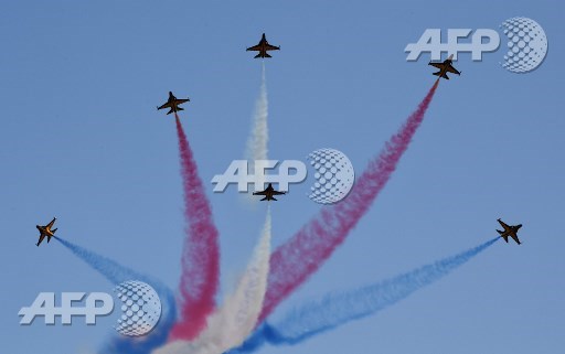 South Koreas Air Force Black Eagles aerobatic team perform during a commemoration ceremony marking South Koreas Armed Forces Day, which will fall on October 1, at the Second Fleet Command of Navy in Pyeongtaek on September 28, 2017. Jung Yeon-Je/Pool/AFP