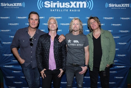 LOS ANGELES, CA: (L-R) Robert DeLeo, Jeff Gutt, Eric Kretz, and Dean DeLeo of Stone Temple Pilots pose backstage during SiriusXM Presents Stone Temple Pilots Live from the Troubadour on November 14, 2017 in Los Angeles, California. Neilson Barnard/Getty Images for SiriusXM/AFP 