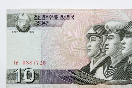 This photo illustration shows a North Korean 10 won currency bank note issued by Pyongyang and displayed in Seoul on January 4, 2018. Ed Jones/AFP