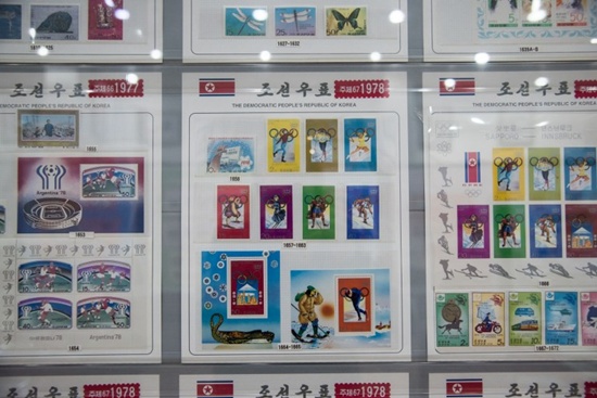 In a photo taken on November 15, 2017 a selection of stamps commemorating North Koreas participation in past winter Olympic Games is displayed at a stamp shop in Pyongyang. Nuclear-armed North Korea on January 5, 2018 accepted the Souths offer of talks next week, said Seouls Unification ministry, which oversees relations with Pyongyang. The meeting will take place in Panmunjom, the truce village in the heavily fortified Demilitarized Zone that divides the peninsula. Ed Jones/AFP