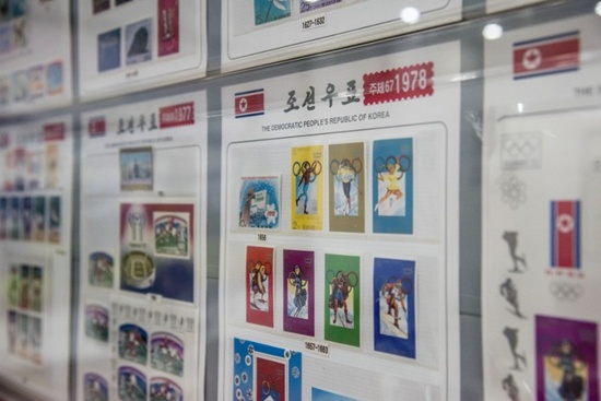 In a photo taken on November 15, 2017 a selection of stamps commemorating North Koreas participation in past winter Olympic Games is displayed at a stamp shop in Pyongyang. Nuclear-armed North Korea on January 5, 2018 accepted the Souths offer of talks next week, said Seouls Unification ministry, which oversees relations with Pyongyang. The meeting will take place in Panmunjom, the truce village in the heavily fortified Demilitarized Zone that divides the peninsula. Ed Jones/AFP