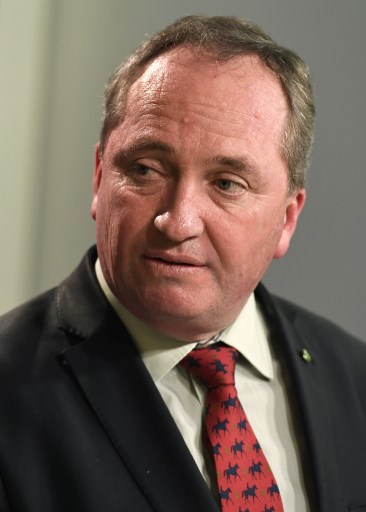 (FILES) This file photo taken on July 5, 2016 shows Australias Deputy Prime Minister Barnaby Joyce addressing a press conference in Sydney. An affair between Australias married deputy prime minister, Barnaby Joyce, and a younger member of his staff, who is now pregnant, gripped Australia on February 8, 2018, reigniting questions over MPs private lives. William West/AFP