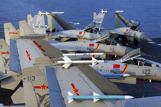 This undated photo taken in April 2018 shows J15 fighter jets on Chinas sole operational aircraft carrier, the Liaoning, during a drill at sea. A flotilla of Chinese naval vessels held a live combat drill in the East China Sea, state media reported early April 23, 2018, the latest show of force by Beijings burgeoning navy in disputed waters that have riled neighbours. AFP