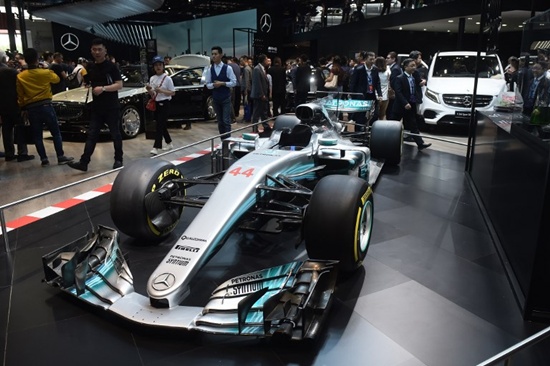A Formula One Mercedes race car is displayed during the Beijing Auto Show in Beijing on April 25, 2018. Industry behemoths like Volkswagen, Daimler, Toyota, Nissan, Ford and others will display more than 1,000 models and dozens of concept cars at the Beijing auto show. Nicolas Asfouri/AFP