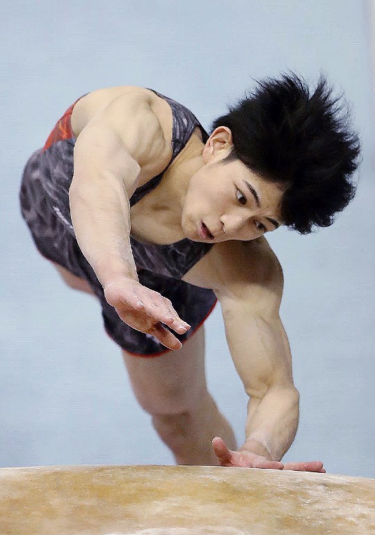 In this picture taken on April 29, 2018 Japanese Kakeru Tanigawa competes in the mens vault during Japans National Gymnastics Championships in Tokyo. Teenage sensation Kakeru Tanigawa was hailed on April 30, 2018 after becoming Japans youngest national gymnastics champion and dashing superstar Kohei Uchimuras attempt for an 11th straight title. Jiji Press/AFP